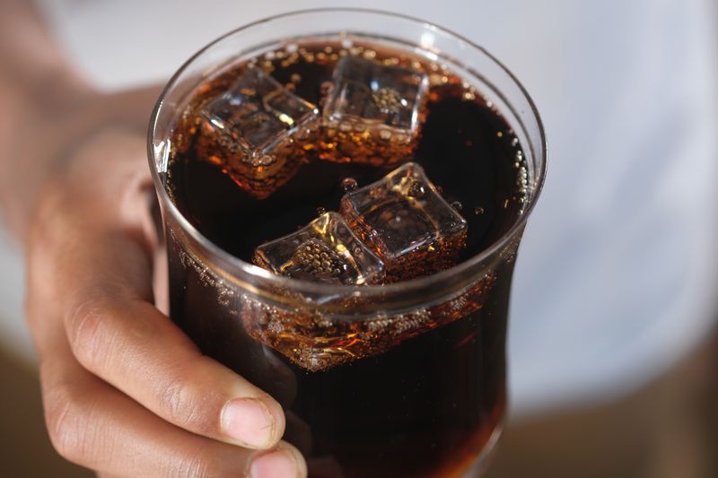 Fountain drink soft beverage served with pizza ranch meals